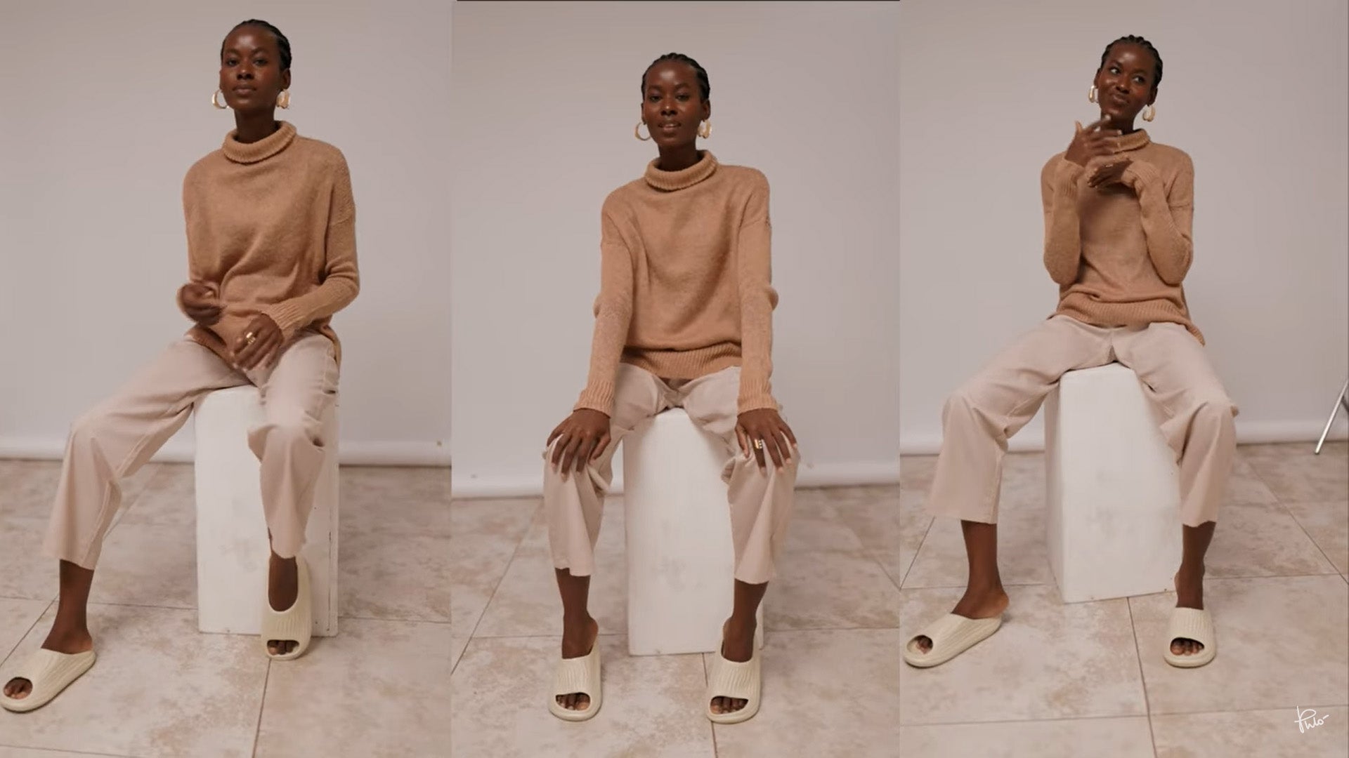 Beautiful African American model posing for fashion photoshoot on white background.