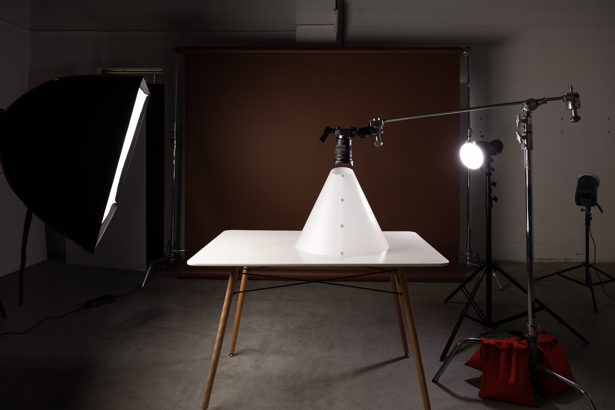 Karl Taylor Light Cone on a table in a photography studio.